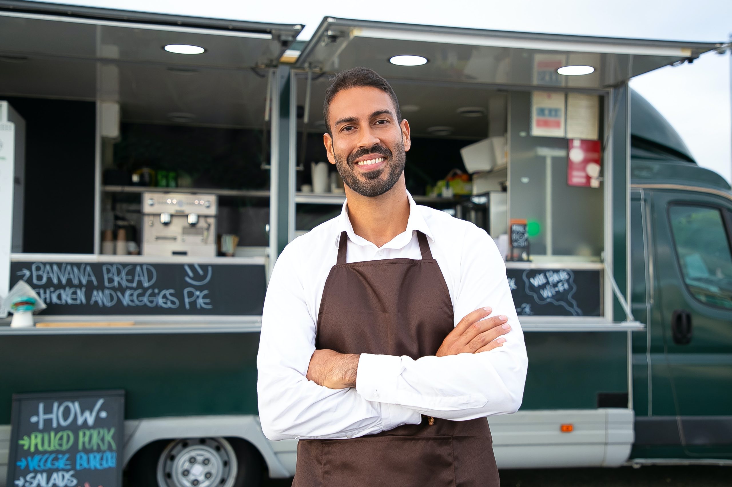 man in front of a food truck